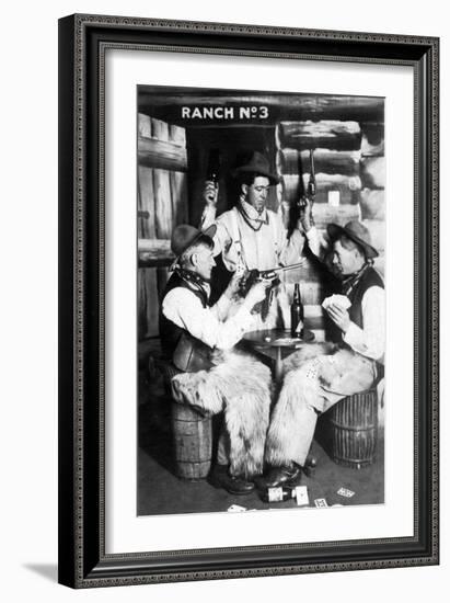 Men Dressed as Cowboys with Bottles of Whiskey, Pistols-Lantern Press-Framed Art Print