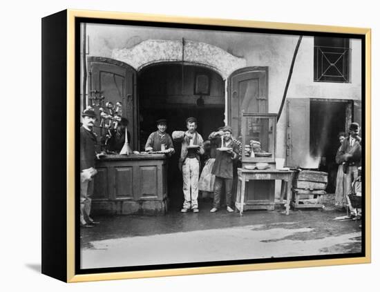 Men Eating Long Spaghetti at a Street Food Shop in Naples, Italy, Ca. 1900-null-Framed Stretched Canvas