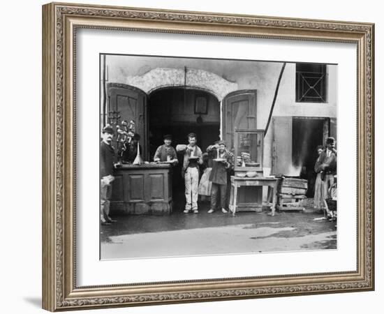 Men Eating Long Spaghetti at a Street Food Shop in Naples, Italy, Ca. 1900-null-Framed Photo