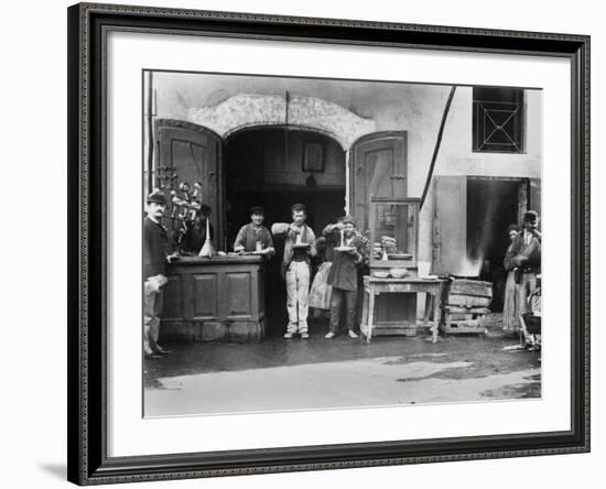 Men Eating Long Spaghetti at a Street Food Shop in Naples, Italy, Ca. 1900-null-Framed Photo