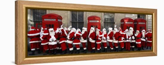 Men from the London Santa School, Dressed in Christmas Outfits, Pose by Telephone Boxes in London-null-Framed Premier Image Canvas