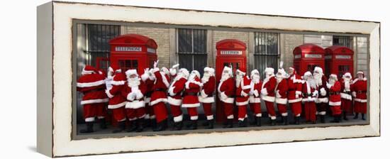 Men from the London Santa School, Dressed in Christmas Outfits, Pose by Telephone Boxes in London-null-Framed Premier Image Canvas