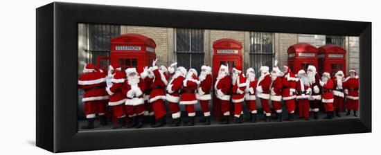 Men from the London Santa School, Dressed in Christmas Outfits, Pose by Telephone Boxes in London-null-Framed Premier Image Canvas