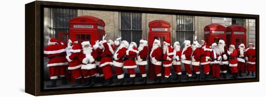 Men from the London Santa School, Dressed in Christmas Outfits, Pose by Telephone Boxes in London-null-Framed Premier Image Canvas