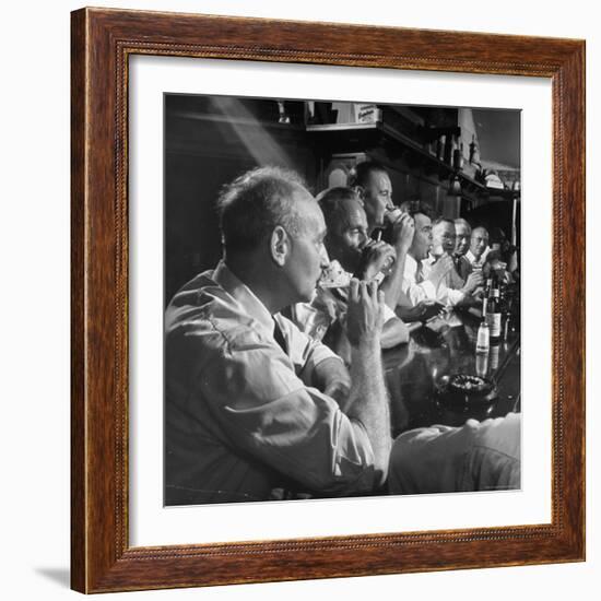 Men Gathered Around For Their Weekly Meeting Indulging in Glasses of Beer-Frank Scherschel-Framed Photographic Print