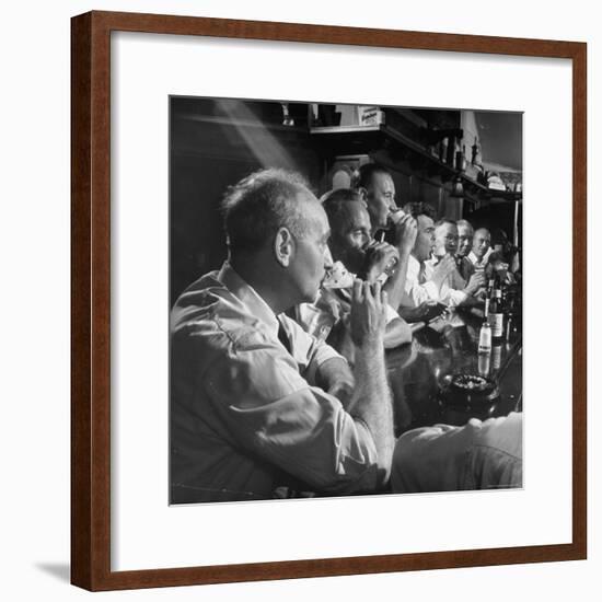 Men Gathered Around For Their Weekly Meeting Indulging in Glasses of Beer-Frank Scherschel-Framed Photographic Print