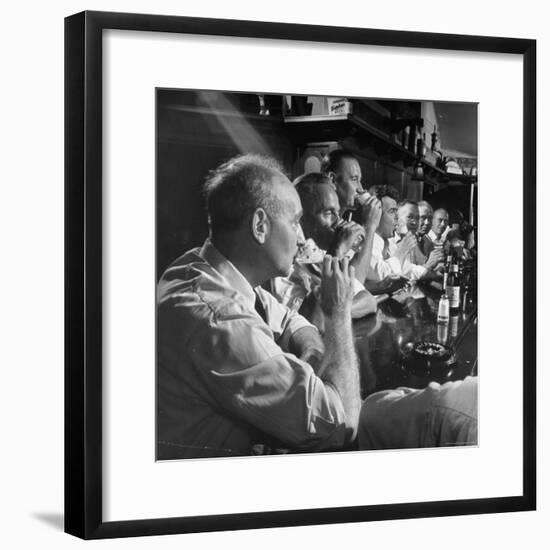 Men Gathered Around For Their Weekly Meeting Indulging in Glasses of Beer-Frank Scherschel-Framed Photographic Print