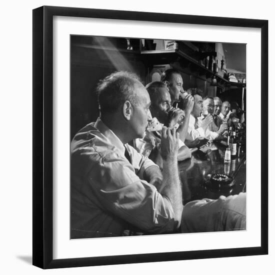 Men Gathered Around For Their Weekly Meeting Indulging in Glasses of Beer-Frank Scherschel-Framed Photographic Print