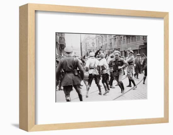 Men in Bolshevik uniform fighting police in the street, Germany, c1918-c1933(?) (1936)-Unknown-Framed Photographic Print