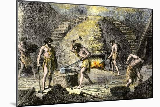 Men of Prehistory Learning to Forge Tools, Beginning of the Iron Age. Colourful Engraving of the 19-null-Mounted Giclee Print