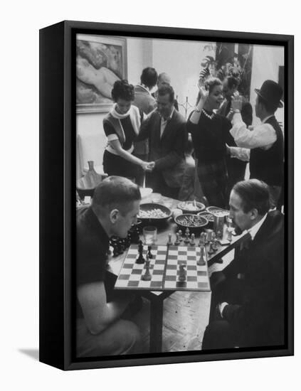 Men Playing Chess at a Cocktail Party-Francis Miller-Framed Premier Image Canvas