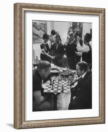 Men Playing Chess at a Cocktail Party-Francis Miller-Framed Photographic Print