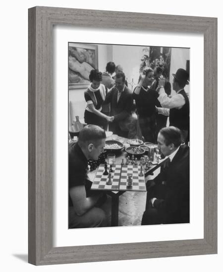 Men Playing Chess at a Cocktail Party-Francis Miller-Framed Photographic Print