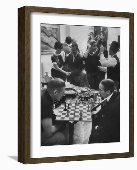 Men Playing Chess at a Cocktail Party-Francis Miller-Framed Photographic Print
