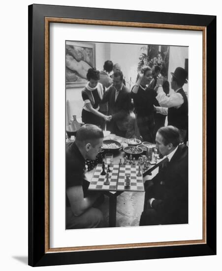 Men Playing Chess at a Cocktail Party-Francis Miller-Framed Photographic Print