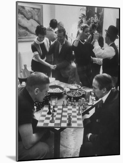 Men Playing Chess at a Cocktail Party-Francis Miller-Mounted Photographic Print