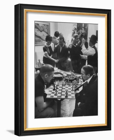 Men Playing Chess at a Cocktail Party-Francis Miller-Framed Photographic Print