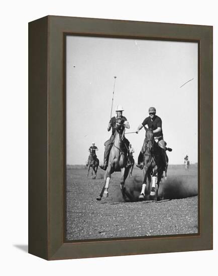 Men Playing Polo-Carl Mydans-Framed Premier Image Canvas