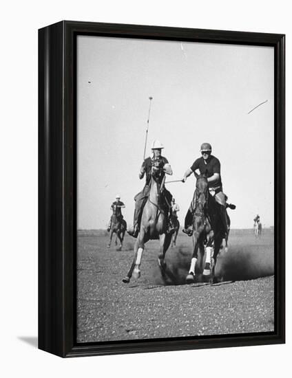 Men Playing Polo-Carl Mydans-Framed Premier Image Canvas