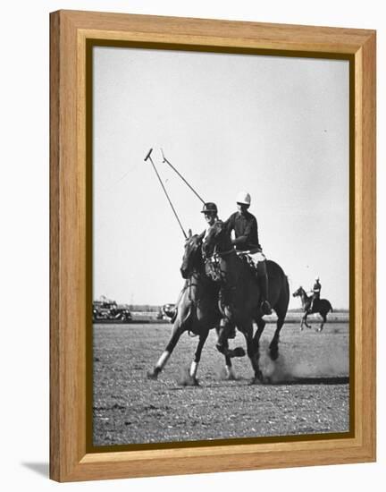 Men Playing Polo-Carl Mydans-Framed Premier Image Canvas