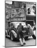 Men Pushing a Car Up a Street, Bilboards Overhead-Carl Mydans-Mounted Photographic Print
