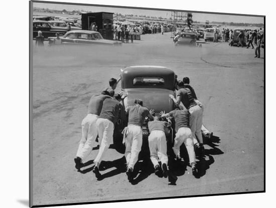 Men Pushing Car During Nat. Hot Rod Assoc. Drag Meet-Ralph Crane-Mounted Photographic Print