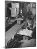 Men Putting Labels on Wine Bottles-Ralph Morse-Mounted Photographic Print
