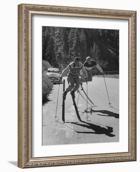 Men Roller Skiing in the Streets-null-Framed Photographic Print