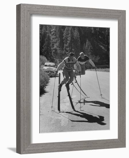 Men Roller Skiing in the Streets-null-Framed Photographic Print