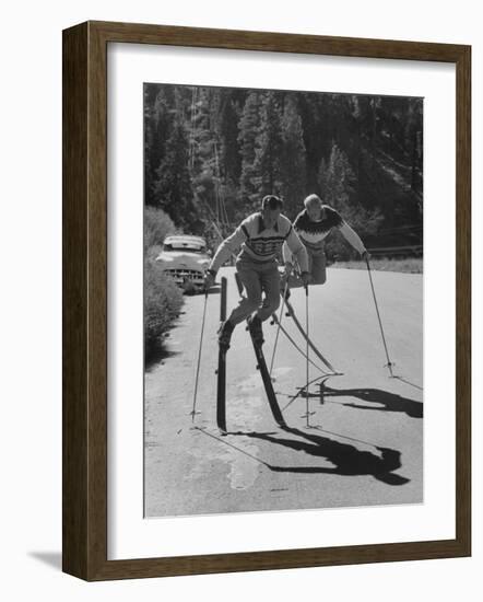 Men Roller Skiing in the Streets-null-Framed Photographic Print