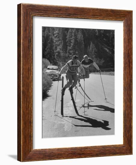 Men Roller Skiing in the Streets-null-Framed Photographic Print