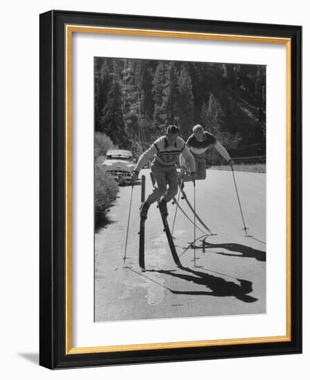 Men Roller Skiing in the Streets-null-Framed Photographic Print