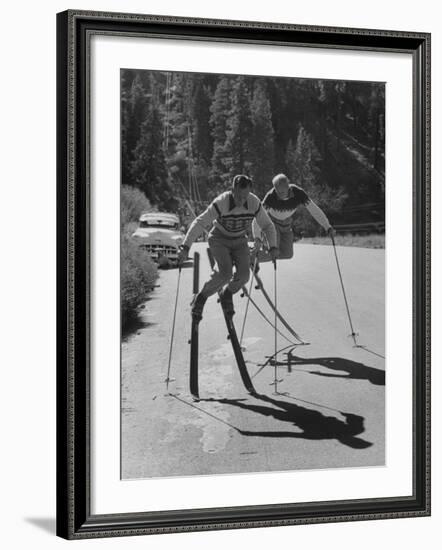 Men Roller Skiing in the Streets-null-Framed Photographic Print