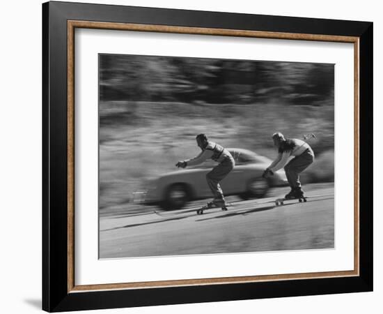 Men Roller Skiing in the Streets-null-Framed Photographic Print