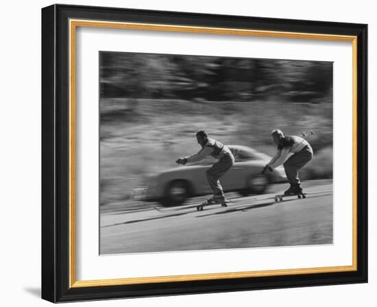 Men Roller Skiing in the Streets-null-Framed Photographic Print