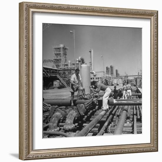 Men Shutting Off Output Valves-Dmitri Kessel-Framed Photographic Print