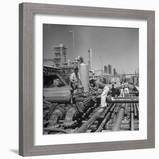 Men Shutting Off Output Valves-Dmitri Kessel-Framed Photographic Print