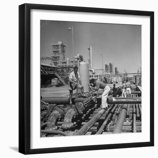 Men Shutting Off Output Valves-Dmitri Kessel-Framed Photographic Print