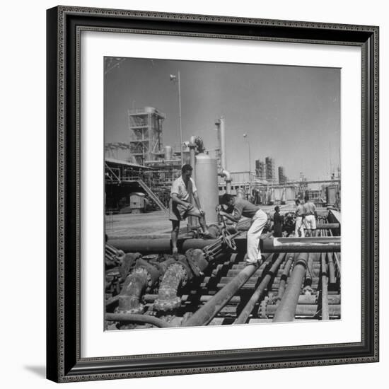 Men Shutting Off Output Valves-Dmitri Kessel-Framed Photographic Print