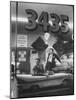 Men Standing in the Window of a Car Dealership-Francis Miller-Mounted Photographic Print