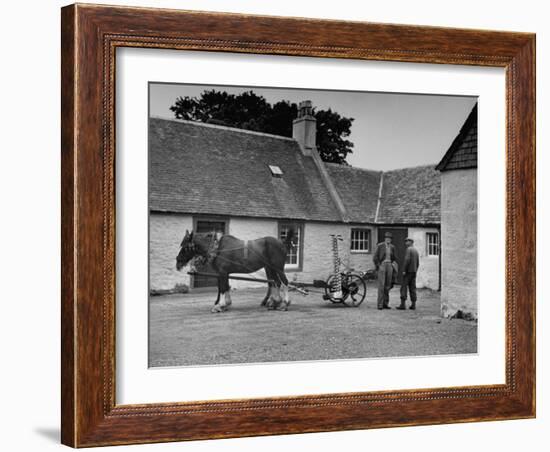 Men Standing Near Horse-Drawn Farming Equipment-null-Framed Photographic Print