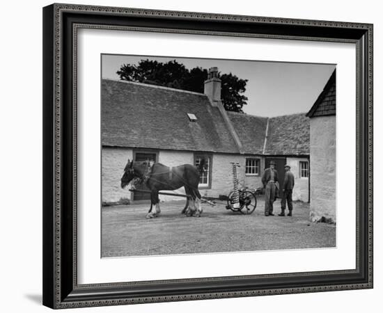 Men Standing Near Horse-Drawn Farming Equipment-null-Framed Photographic Print