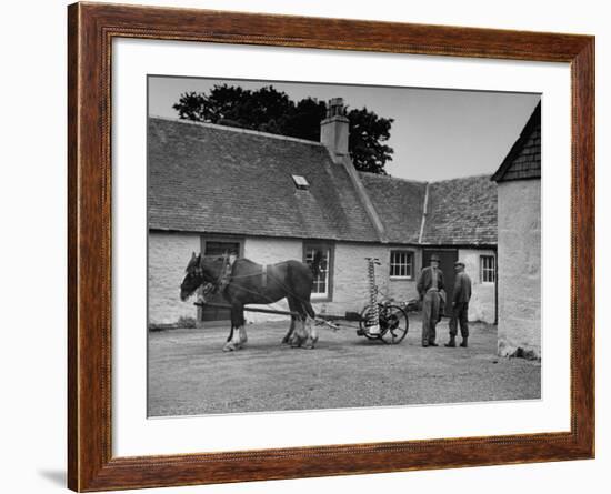 Men Standing Near Horse-Drawn Farming Equipment-null-Framed Photographic Print