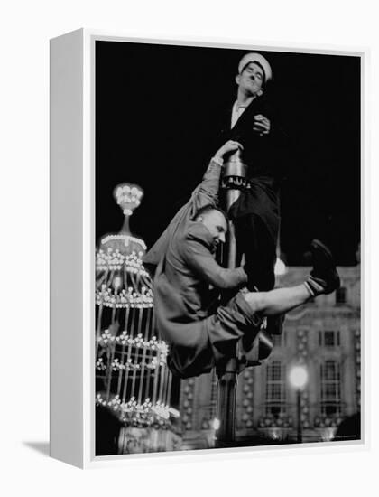 Men Struggling to Gain Vantage Point to Watch the Celebration of Coronation of Queen Elizabeth Ii-Thomas D^ Mcavoy-Framed Premier Image Canvas