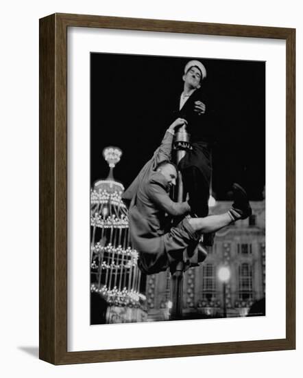 Men Struggling to Gain Vantage Point to Watch the Celebration of Coronation of Queen Elizabeth Ii-Thomas D^ Mcavoy-Framed Photographic Print