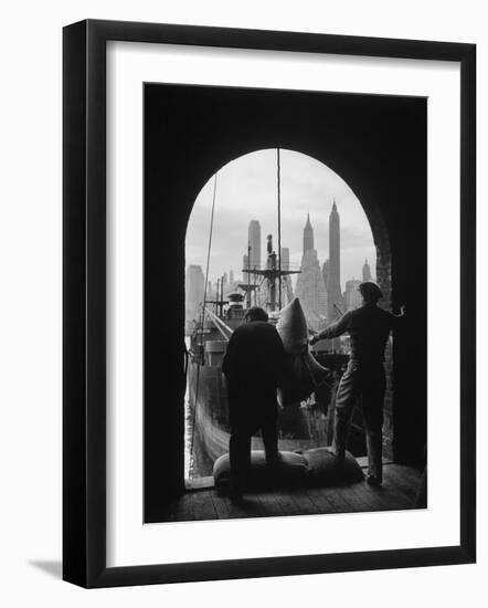 Men Unloading Coffee at Brooklyn Dock. View of Downtown Manhattan in Background-Andreas Feininger-Framed Photographic Print