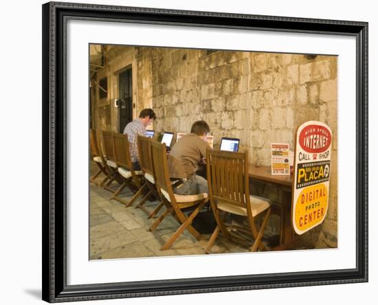 Men working at outdoor internet café, Dubrovnik, Dalmatia, Croatia-Merrill Images-Framed Photographic Print