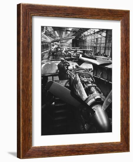 Men Working on Partially Completed Jets at New Vickers Plant-Carl Mydans-Framed Photographic Print