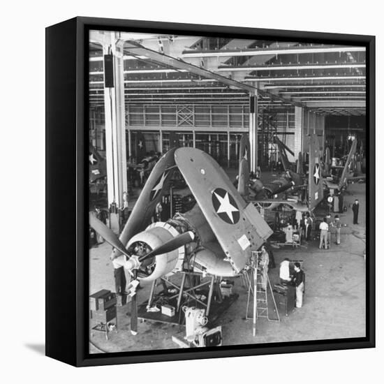 Men Working on the Aircrafts Final Constructing Stages-Peter Stackpole-Framed Premier Image Canvas