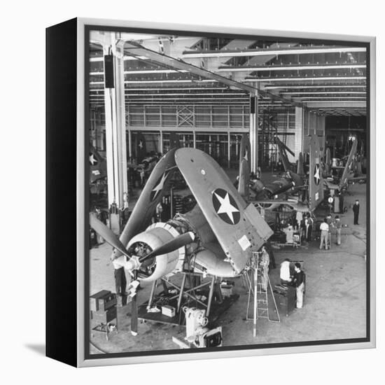 Men Working on the Aircrafts Final Constructing Stages-Peter Stackpole-Framed Premier Image Canvas